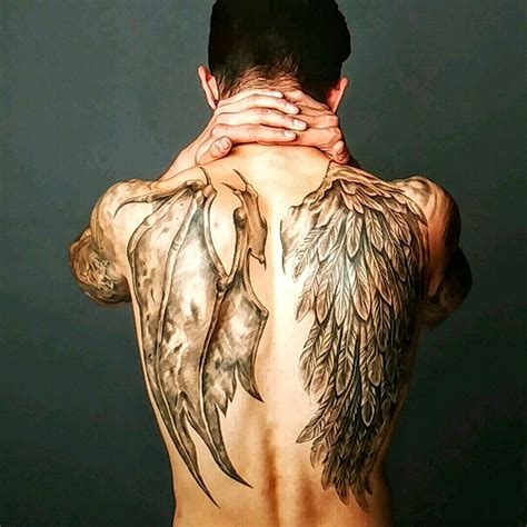 half angel and half devil tattoo|half angel half demon chest tattoo.